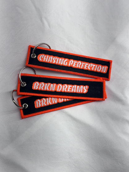 BORDERED JET TAGS